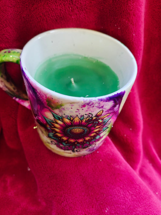 16oz ceramic coffee mug with green candle