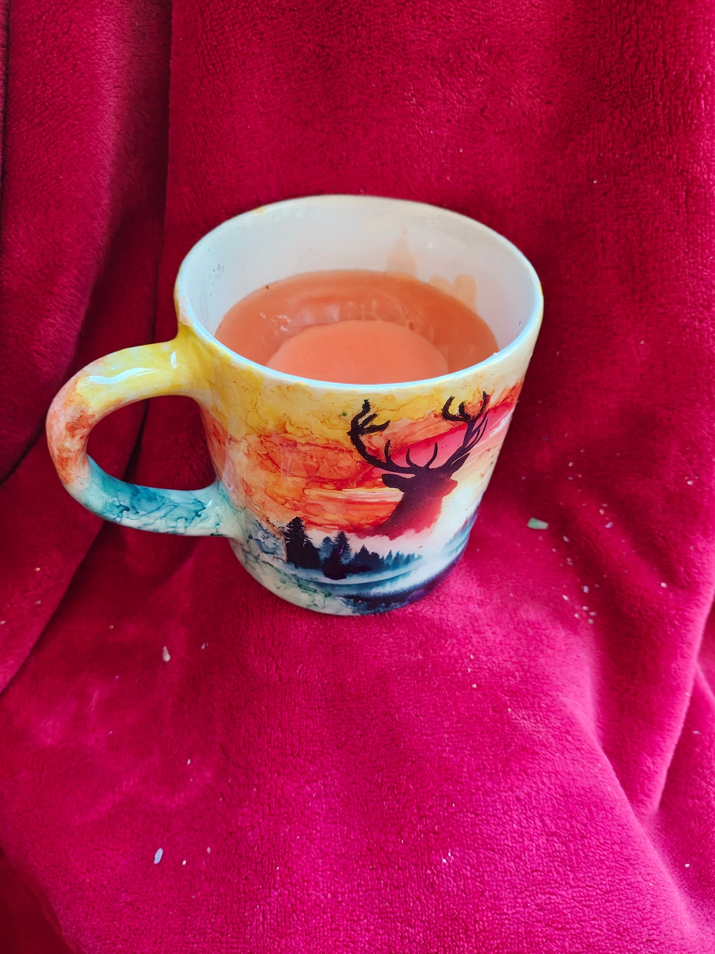 16oz ceramic coffee mug with orange candle