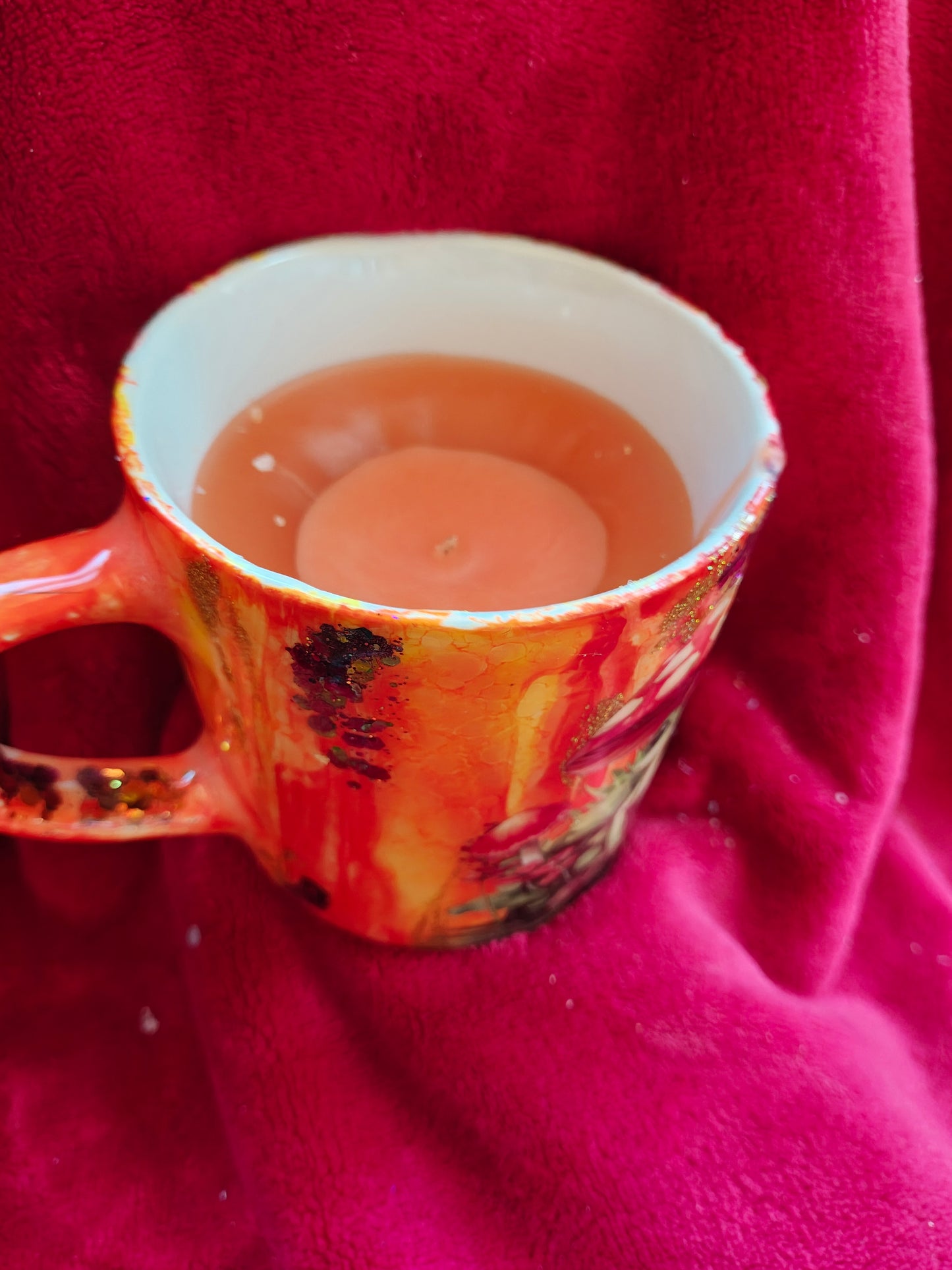 16oz ceramic coffee mug with orange candle