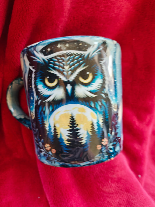 16oz ceramic coffee mug with blue candle