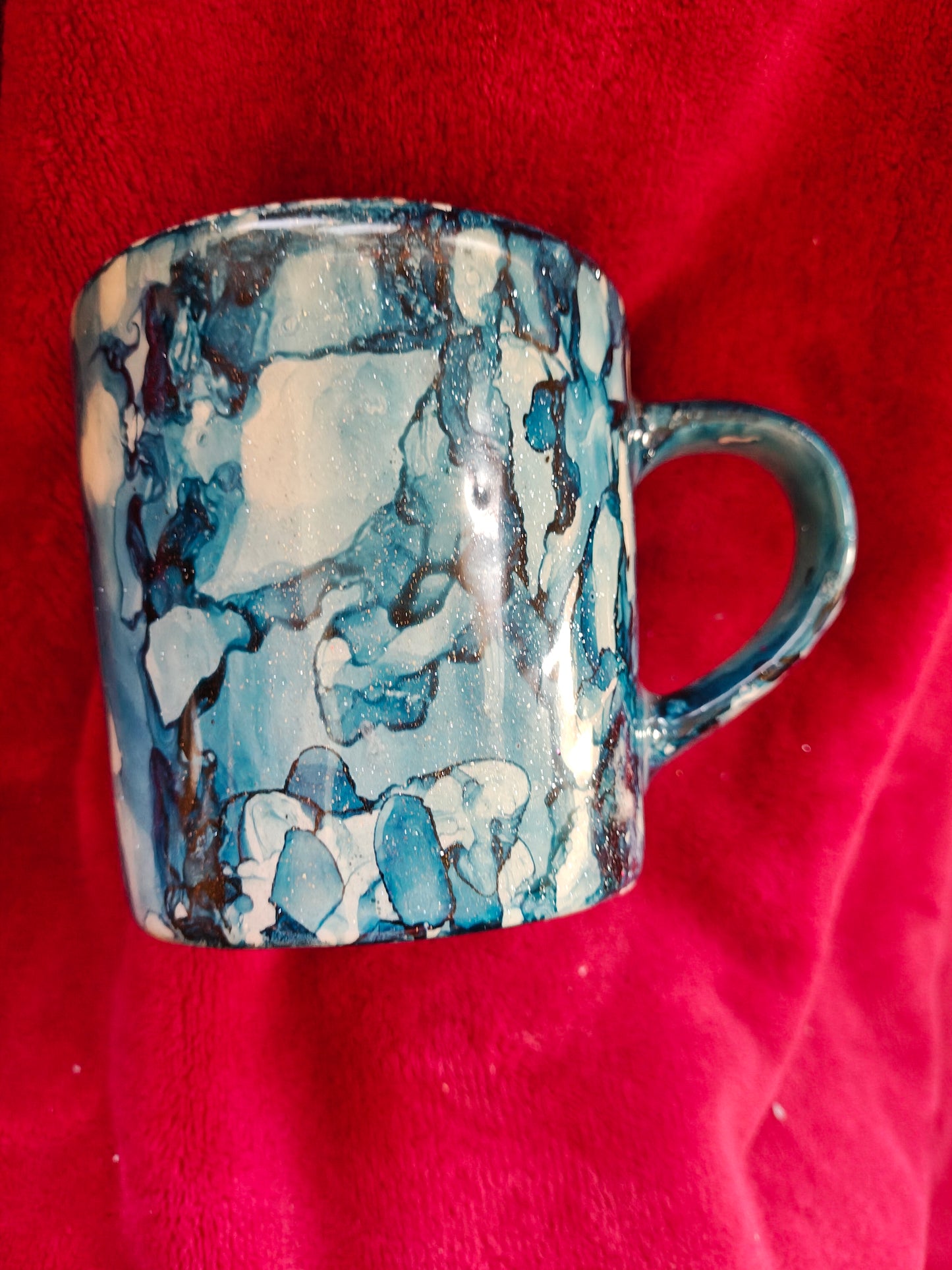 16oz ceramic coffee mug with blue candle