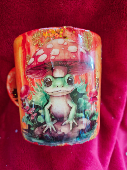 16oz ceramic coffee mug with orange candle