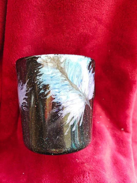 16oz ceramic coffee mug with blue candle